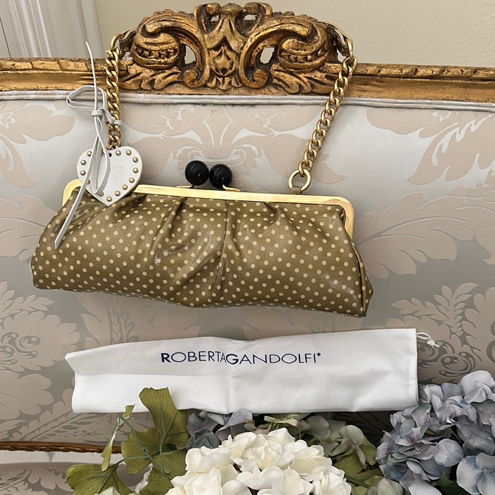 Never used Italian, real leather clutch, made in Italy. Polkadot.